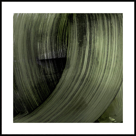 The image is a close-up of a textured, green-colored surface, possibly a leaf or a fabric. The surface has a repeating pattern of vertical lines and curves, creating a sense of movement and depth. The image does not contain any discernible objects or actions, and there are no specific actions or movements captured. The image is a still life composition, focusing on the texture and pattern of the green surface.