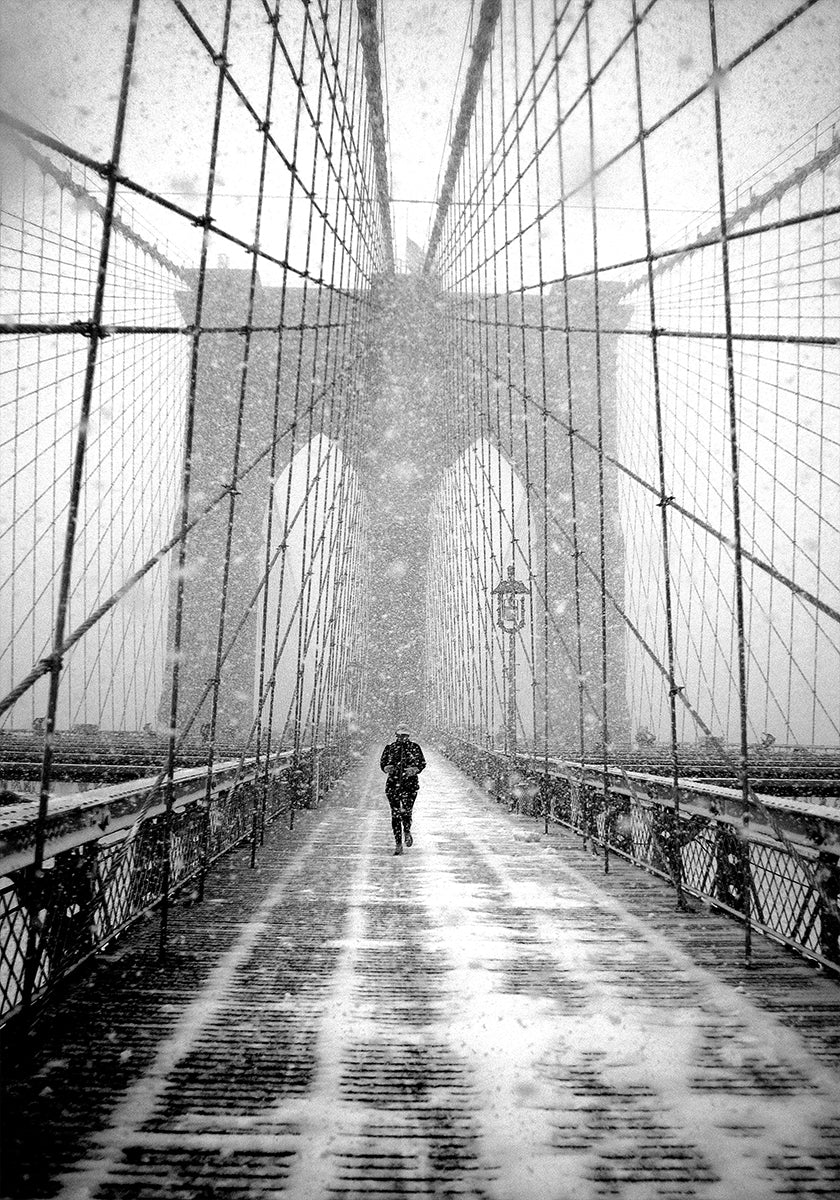 New York Walker in Blizzard - Brooklyn Bridge Poster