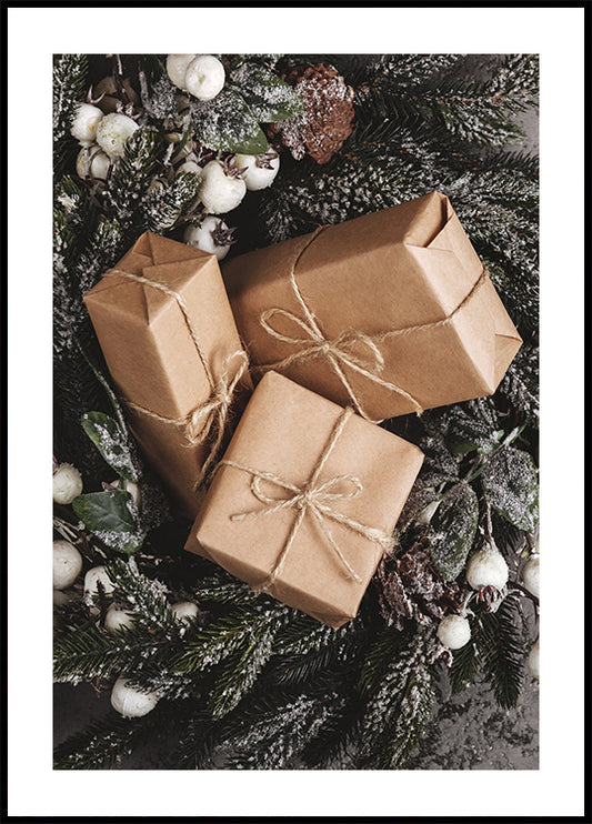 two wrapped presents sitting on top of a christmas tree