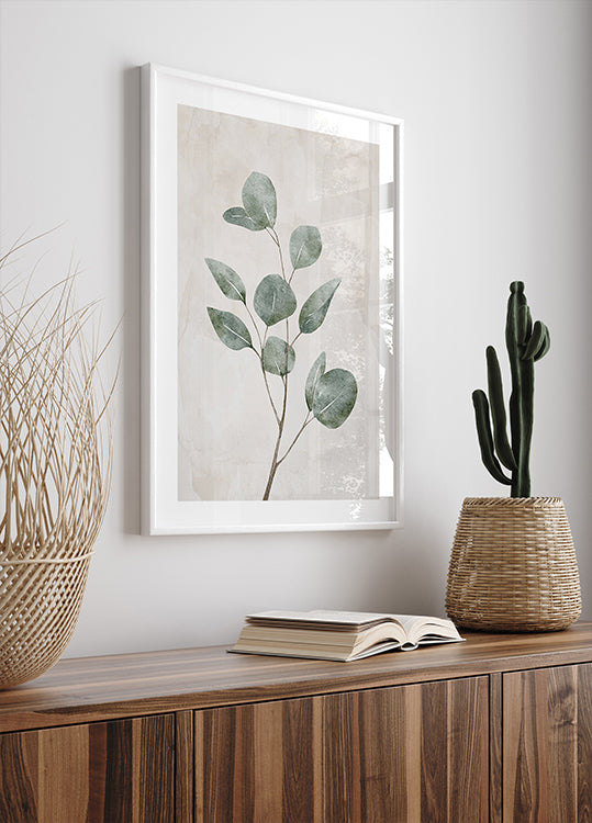 a picture of a plant and a book on a shelf