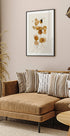 a living room filled with furniture and a plant