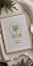 a picture of a plant in a snow globe