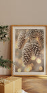 a picture of a pine cone hanging from a christmas tree