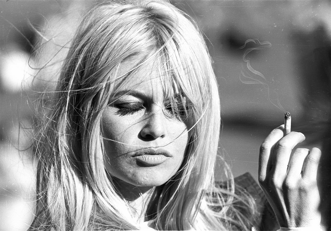 Brigitte Bardot With Cigarette On Wind Poster