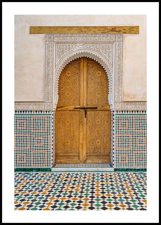 Decorated brown wooden door in Morocco Poster