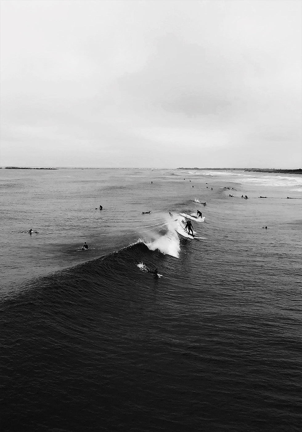 Surfers On Waves B&W Poster