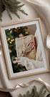 a picture of a person holding a wrapped present