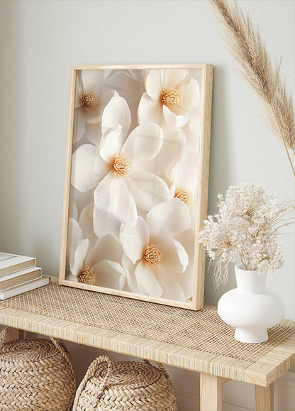 a picture of white flowers in a wooden frame