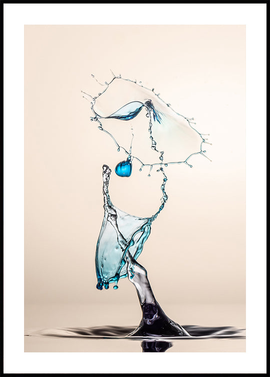 A close-up of a water droplet splashing, creating a dynamic and visually striking scene.