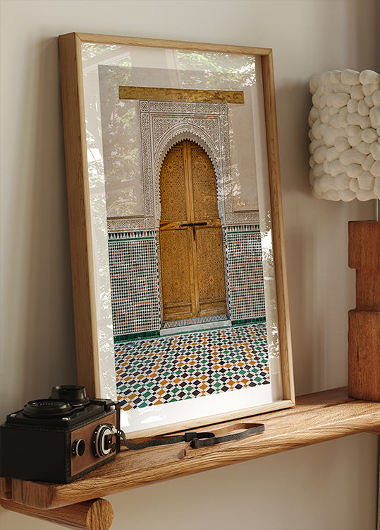 Decorated brown wooden door in Morocco Poster